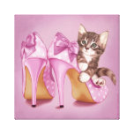 Kitten in purple shoe stretched canvas prints