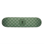 Leafy pattern on olive green skateboard