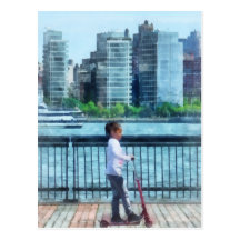 Little Girl on Scooter by Manhattan Skyline Post Card