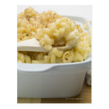 Macaroni cheese in baking dish with wooden post card