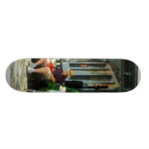 Man Reading by Book Stall Skateboard