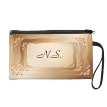 Monogram beige wristlet purses