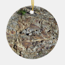 Mountain Rock Wall with Tiny Yellow Flowering Plan Christmas Tree Ornaments