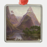 Native figures in a canoe at Milford Sound Christmas Ornament