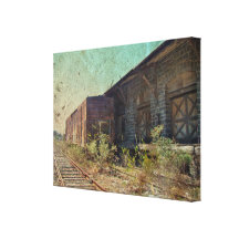 Old Rail Car and Train Station Stretched Canvas Print