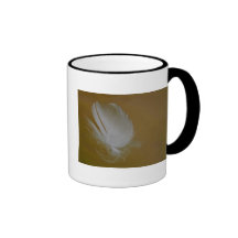On A Wisp of a feather Mugs