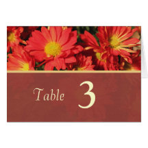 Orange daisy flowers dinner table number card