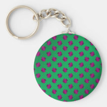 Pink shamrocks on green background keychains