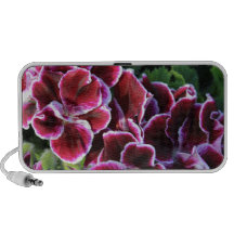 Purple Flowers on a field of greens Travelling Speaker
