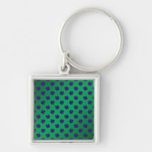 Purple shamrocks on green background key chain