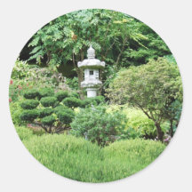 Quiet solitude and lush green of a Japanese Garden Round Stickers