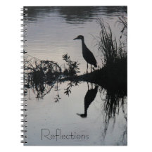 Reflections, Heron on waterfront Spiral Notebooks