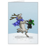Reindeer and Penguin in the Snow Greeting Card