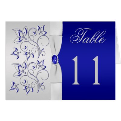 This royal blue floral and silver table number card matches the invitation 