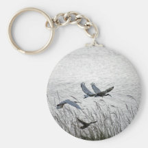 Sacred ibises in flight keychains