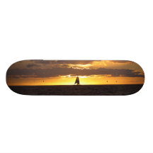 Sail boat at sunset skateboard
