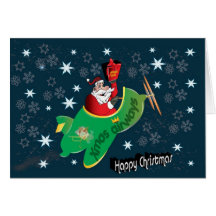 Santa in his magical aeroplane greeting card