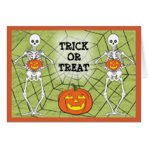 Skeleton holding pumpkin greeting card