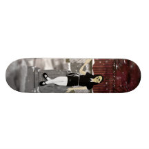 skull face girl sitting on tombstone skate board