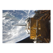 Space Shuttle Atlantis' payload bay backdropped Photograph