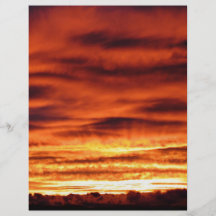 Sunrise peeking through the clouds flyers