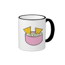 tortilla chips in dip mug