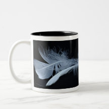 Touching feathers coffee mugs