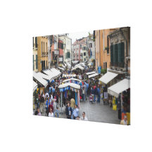 Tourists in a street market, Venice, Italy Stretched Canvas Print