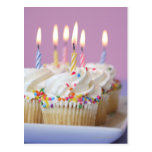 Tray of birthday cupcakes with candles post cards