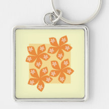 Tropical orange flowers on cream. Pretty. Key Chain