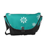 Turquoise and white snowflakes pattern messenger bags