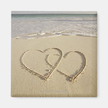 Two overlying hearts drawn on the beach magnets