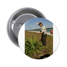 U.S. Fish and Wildlife employee looking at yucca p Pin