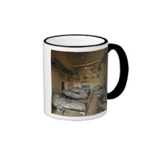 US Soldiers sleep in an abandoned mud house Mug