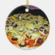 vegetarian pizza, with olives and capsicum ornament