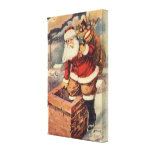 Victorian Santa Claus Climbing Down the Chimney Canvas Prints