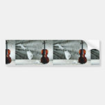 Violin with music sheets floating bumper stickers