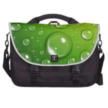 Water drops on green laptop bag