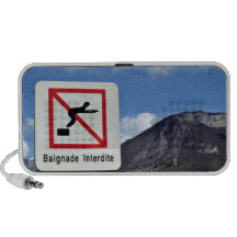 Waterscape with warning sign against the mountain mini speakers