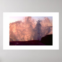 Wave crashing against rock at sunset  posters
