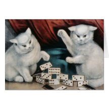 white kittens playing dominos card