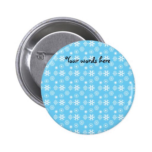 White snowflakes on blue buttons