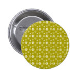 White snowflakes on gold buttons