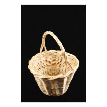 Wicker basket on black background photograph