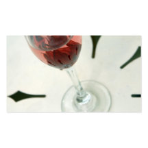 Wine glass with flower petals inside business card templates
