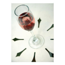 Wine glass with flower petals inside personalized invitations