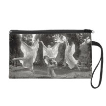 Woman dancing wristlet clutch