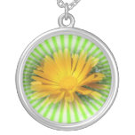 yellow flower, daisy, and green starburst necklaces