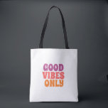 اً: Colorful Good Vibes Only Tote Bag<br><div class="desc">​Spread positivity with this stylish 'Good Vibes Only' tote bag. Featuring a vibrant and modern typography design in pink and orange tones,  this durable canvas bag is perfect for shopping,  school,  beach trips,  or daily errands. A great motivational gift for friends and family.</div>