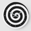 Search for black and white spiral clocks Abstract